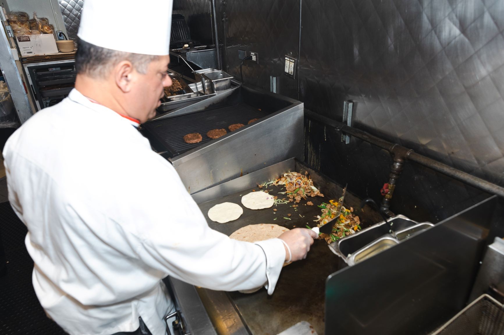 Chef Mike prepares Beyond Steak on the grill Chef Mike prepares Beyond Steak on the grill