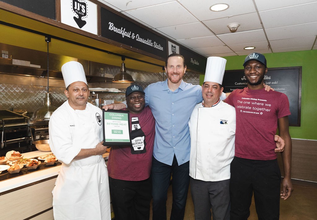 Ethan Brown (center; Beyond Meat CEO and BUS'08) with the Dining team members from left: Jeremiah, Charlie, Chef Mike, and Leon