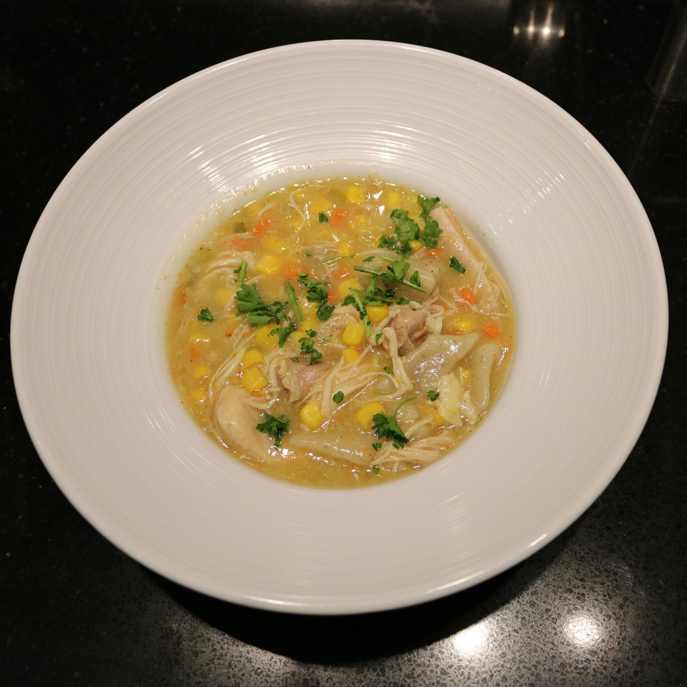 Chicken and dumplings in a bowl