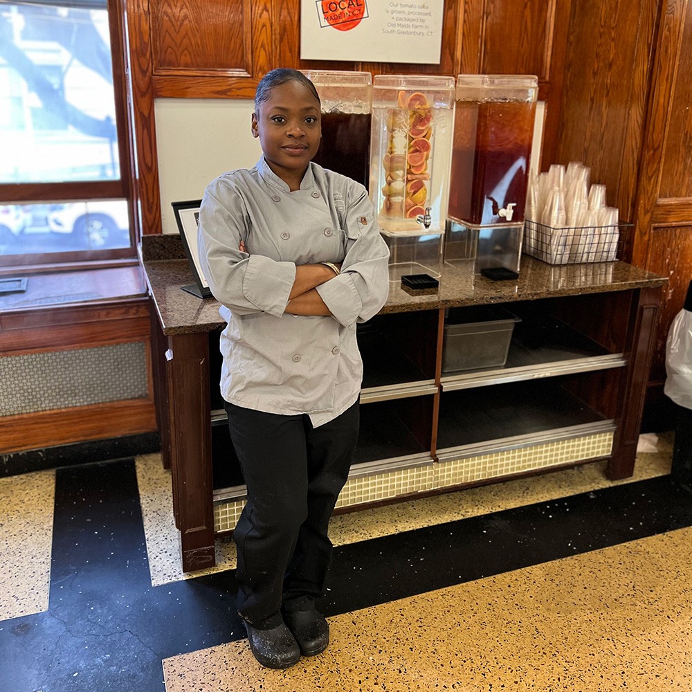 Kaleema is serious about her carrot juice Kaleema at the beverage station