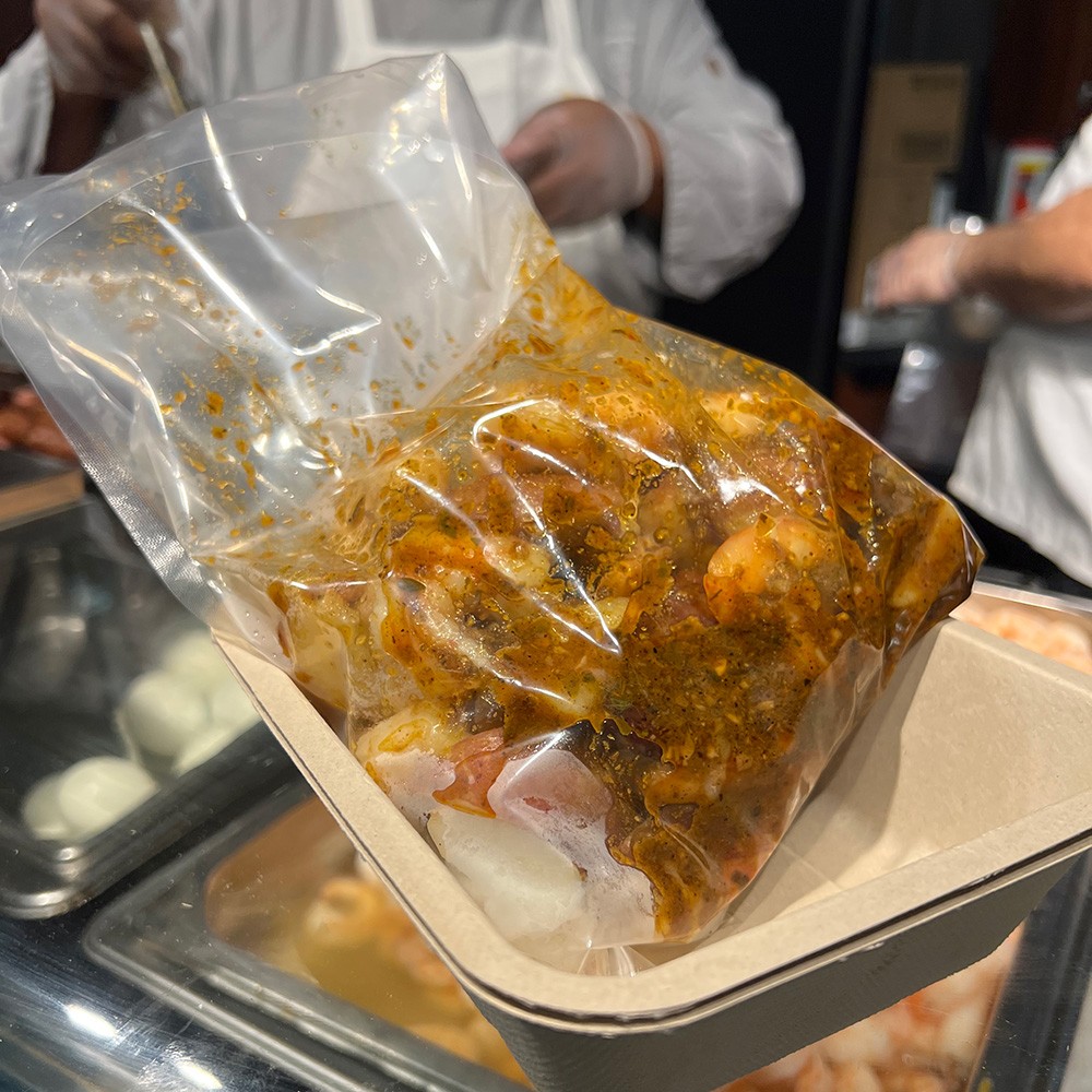 Students were served the traditional way: with the seafood boil in a bag Seafood boil bag