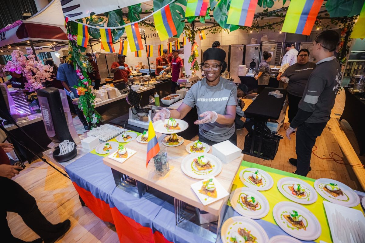 A Ferris staff member arranges food