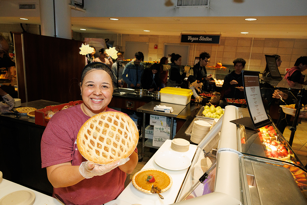Who needs the other Thanksgiving fixings when there's PIE? Staff holding pie