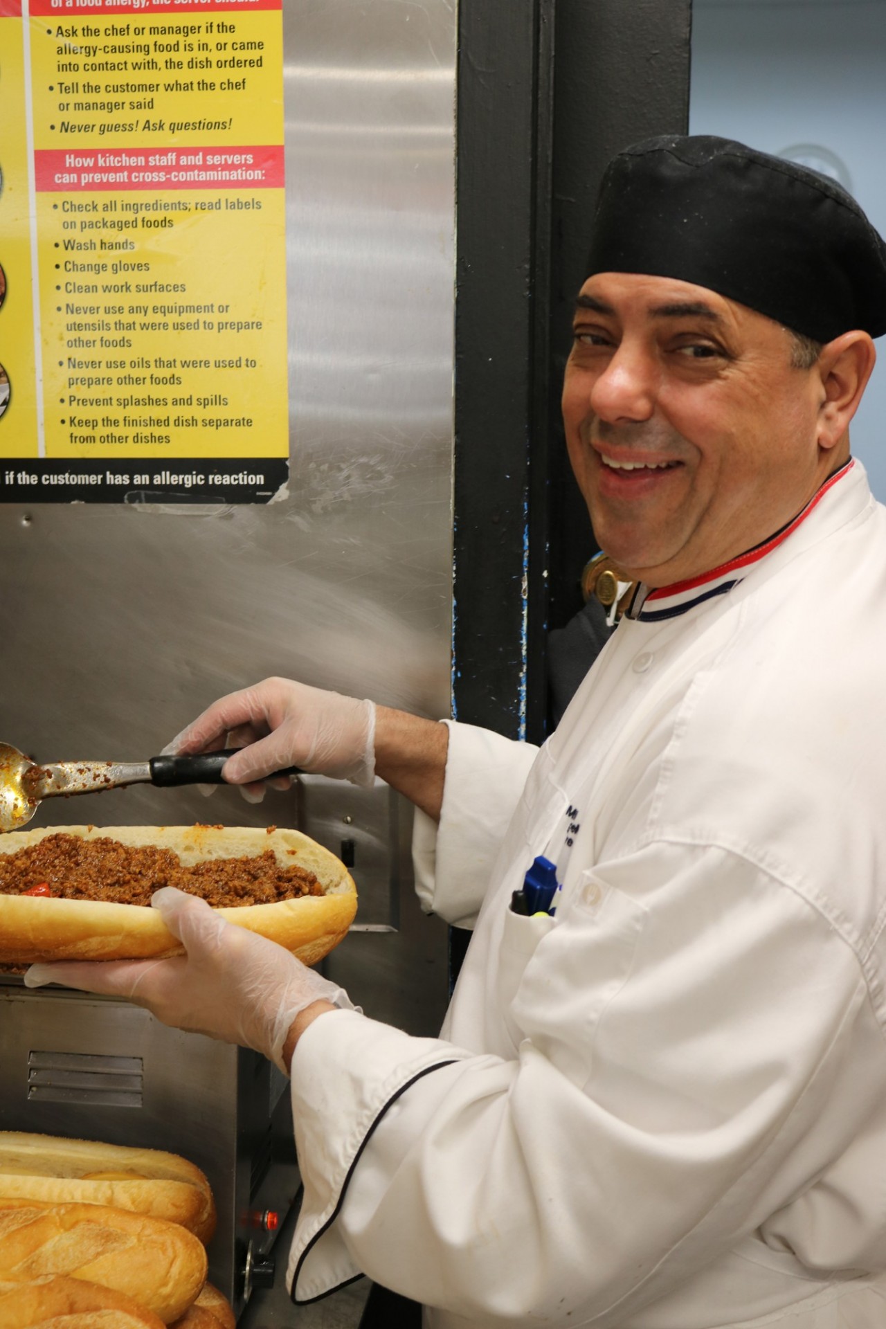 Chef Mike assembling a luna frita sub