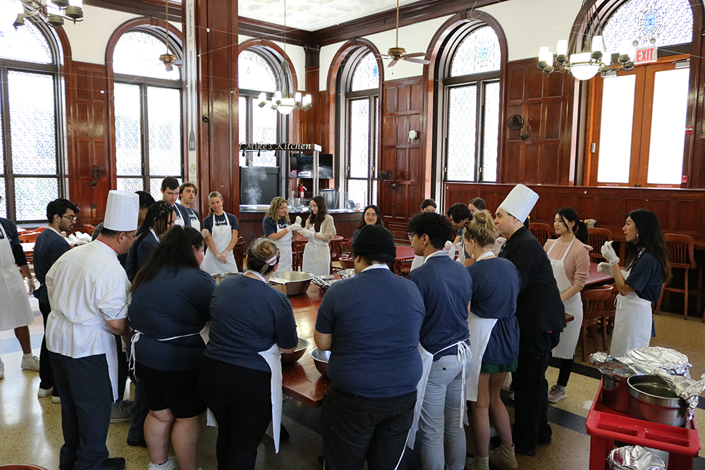 It was a full house in John Jay! The class standing around tables in John Jay