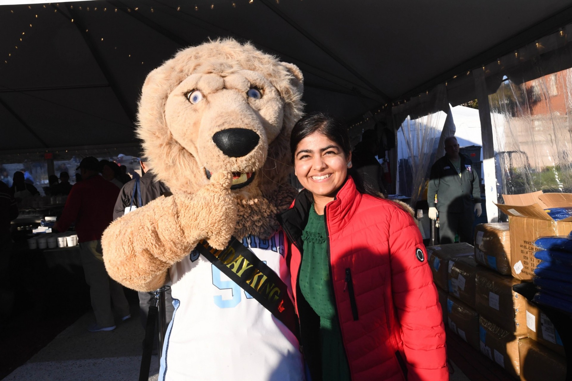 A student and Roaree at the tent entrance