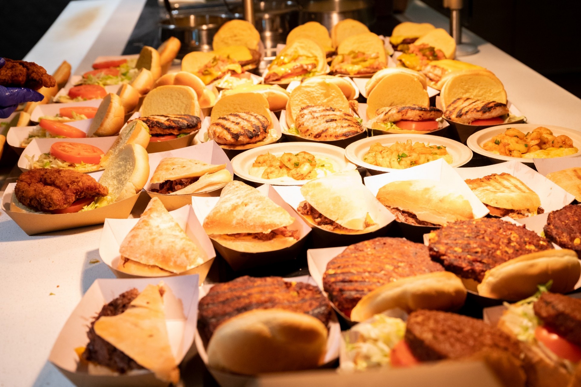Sandwiches, burgers, and mac and cheese at the grill station
