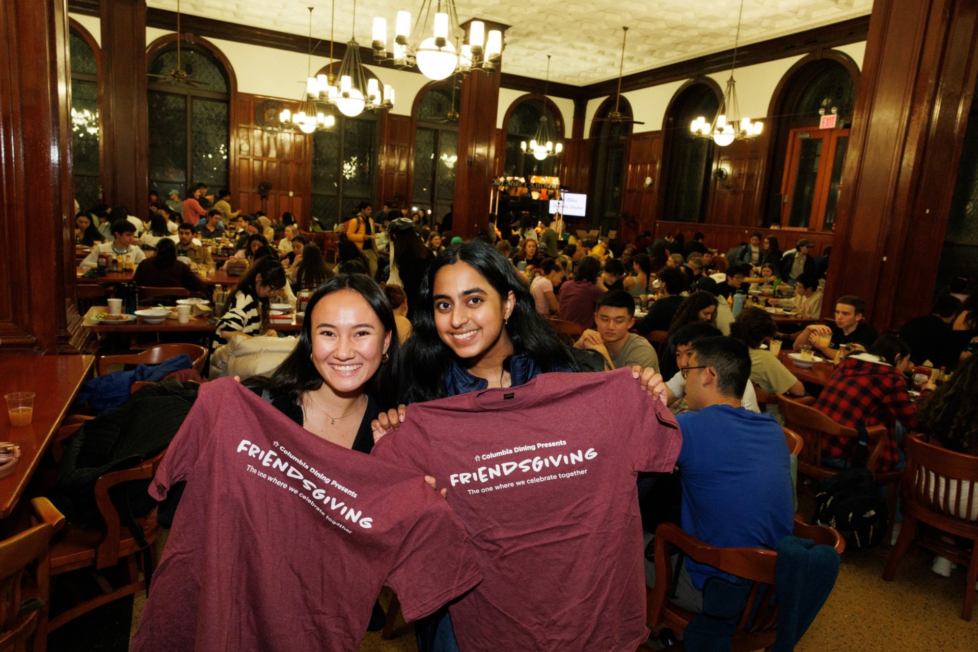 #Twinning students holding up their Friendsgiving tee
