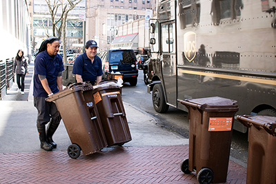 staff taking out the compost