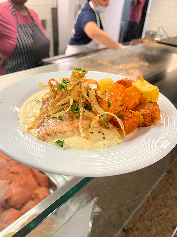 Salmon served with roasted vegetables and a celery root puree