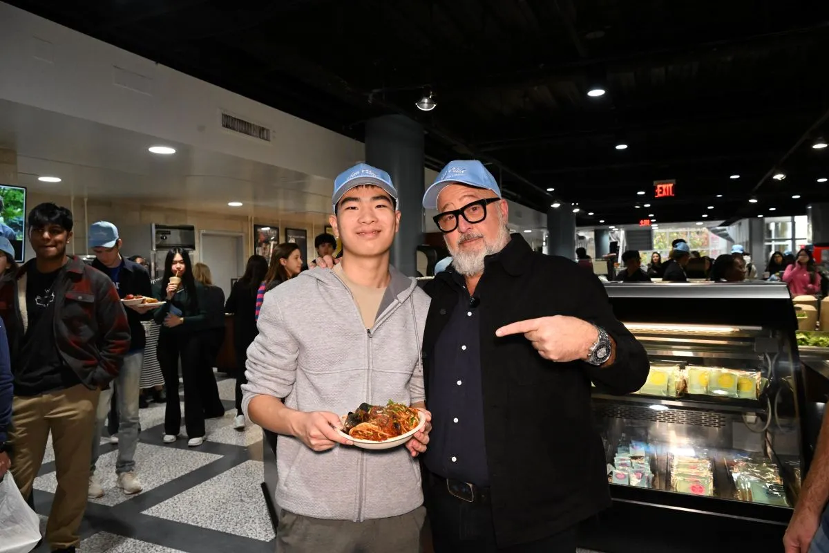 Chef Zimmern greets a student
