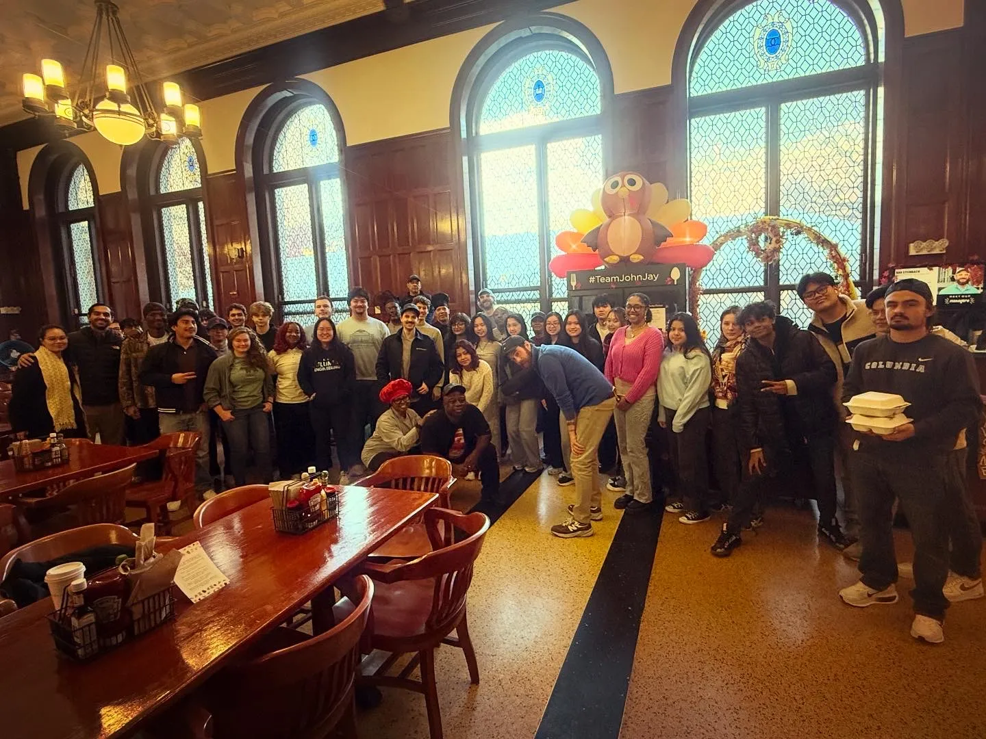 Columbia students and staff pose together