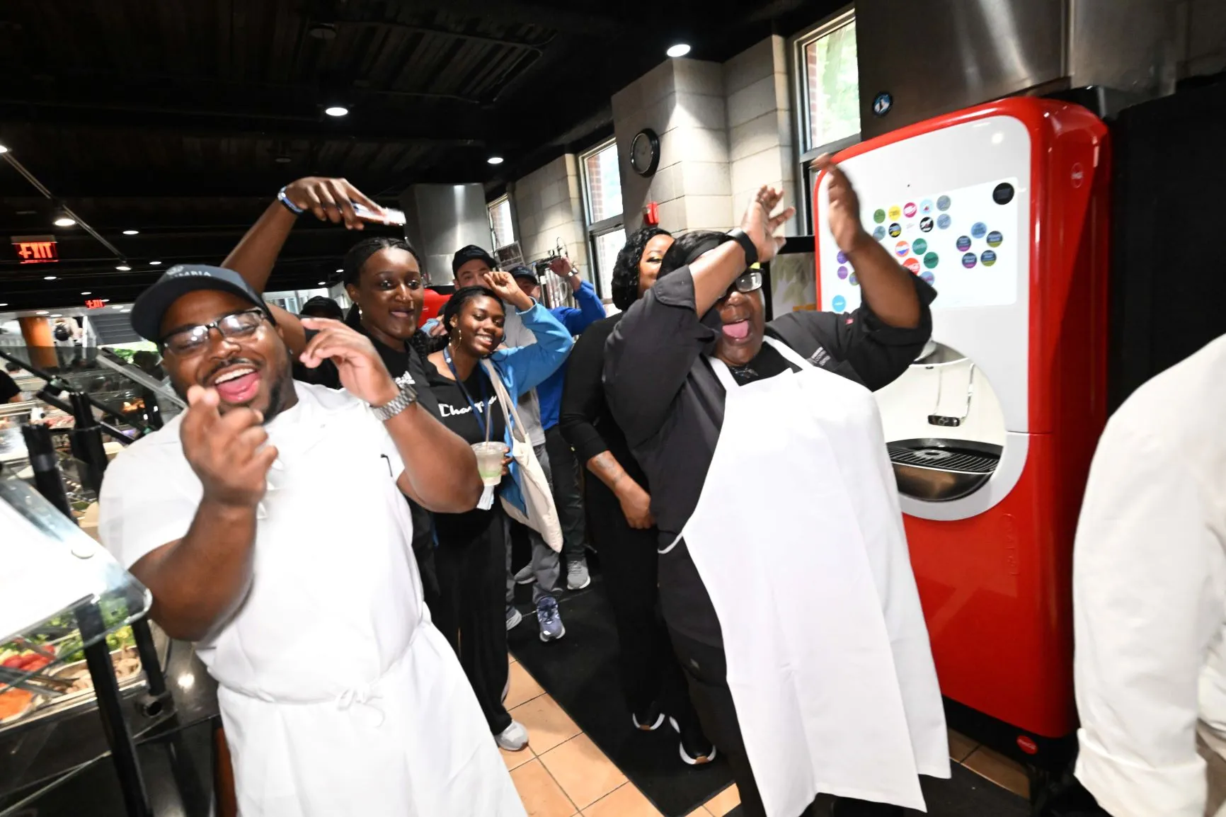 Dining staff cheer on President Armstrong
