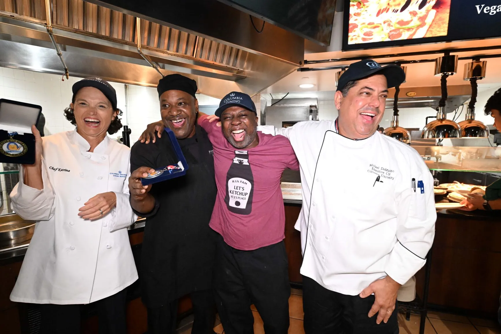 Chef Mike awarded President Armstrong the medal for the egg cracking competition