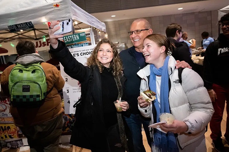 Students taking a selfie with Chef Irvine