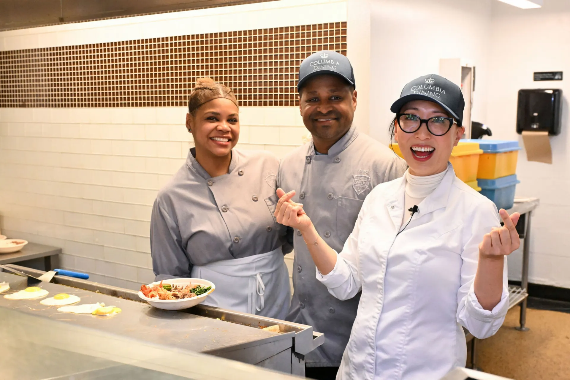 Chef Joo with Columbia Dining staff who prepared recipes from her cookbook K-Quick