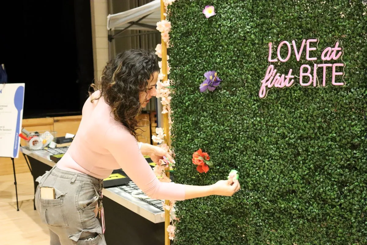Mel adds finishing touches to the decorations