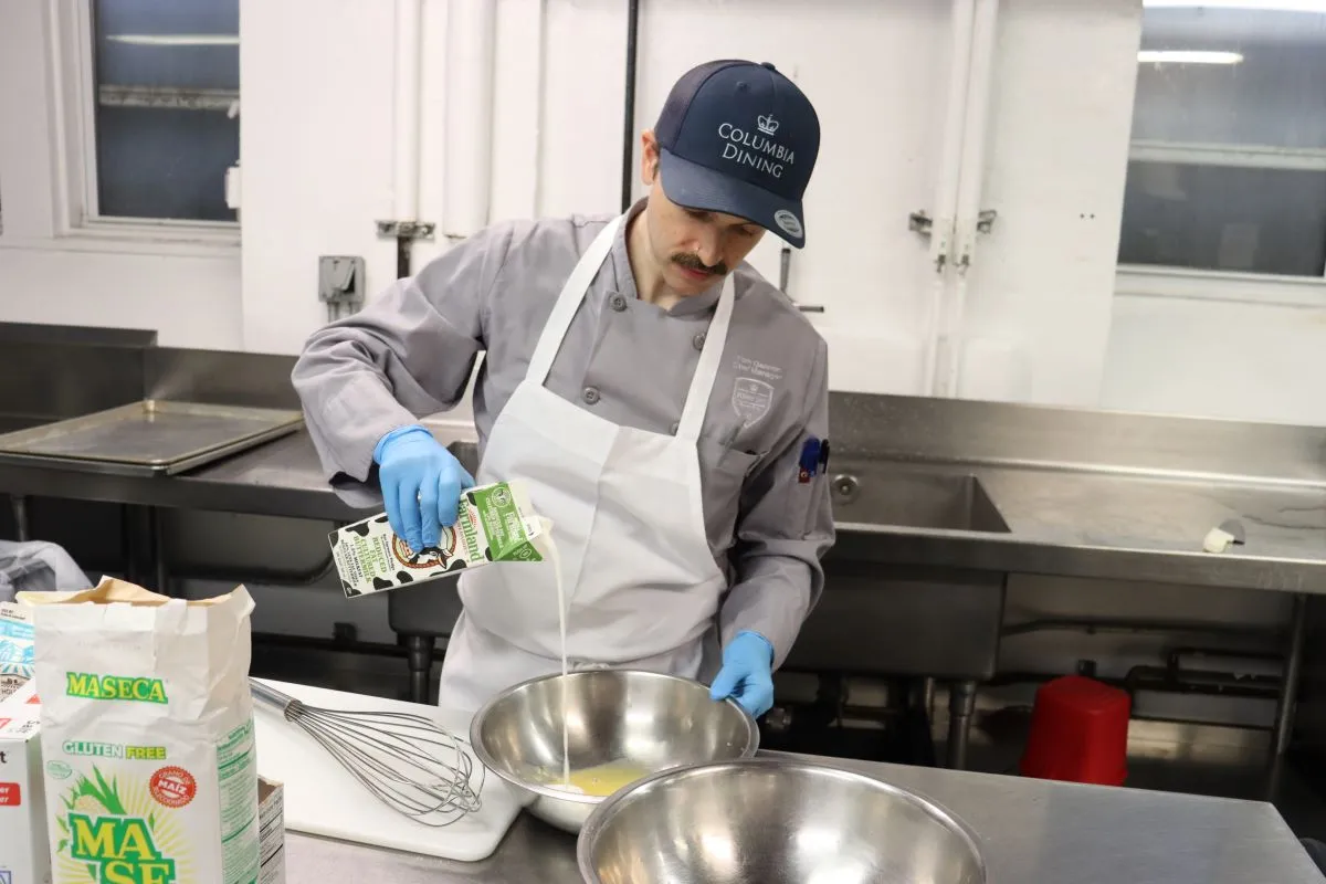 Chef Tom prepares the waffle batter