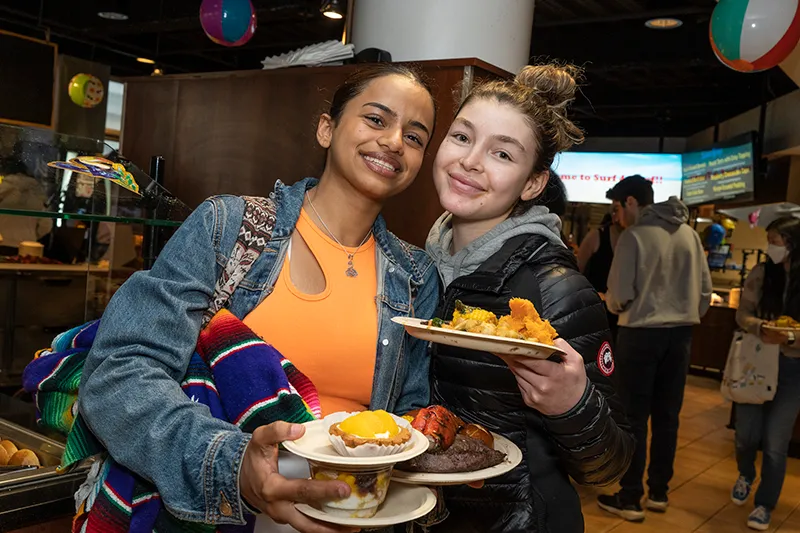 Students with plates of food at Ferris