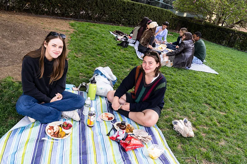 Students sitting on the lawn