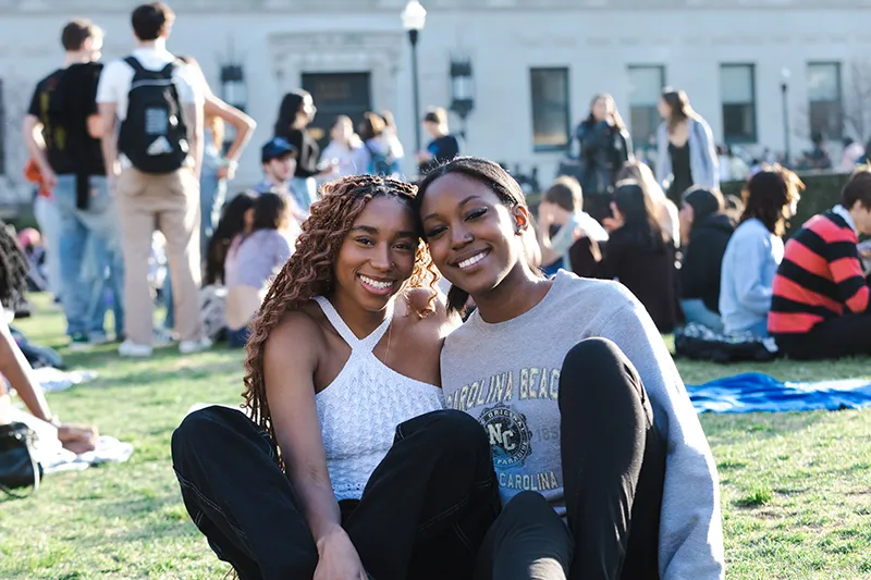 Students sitting on Butler lawn