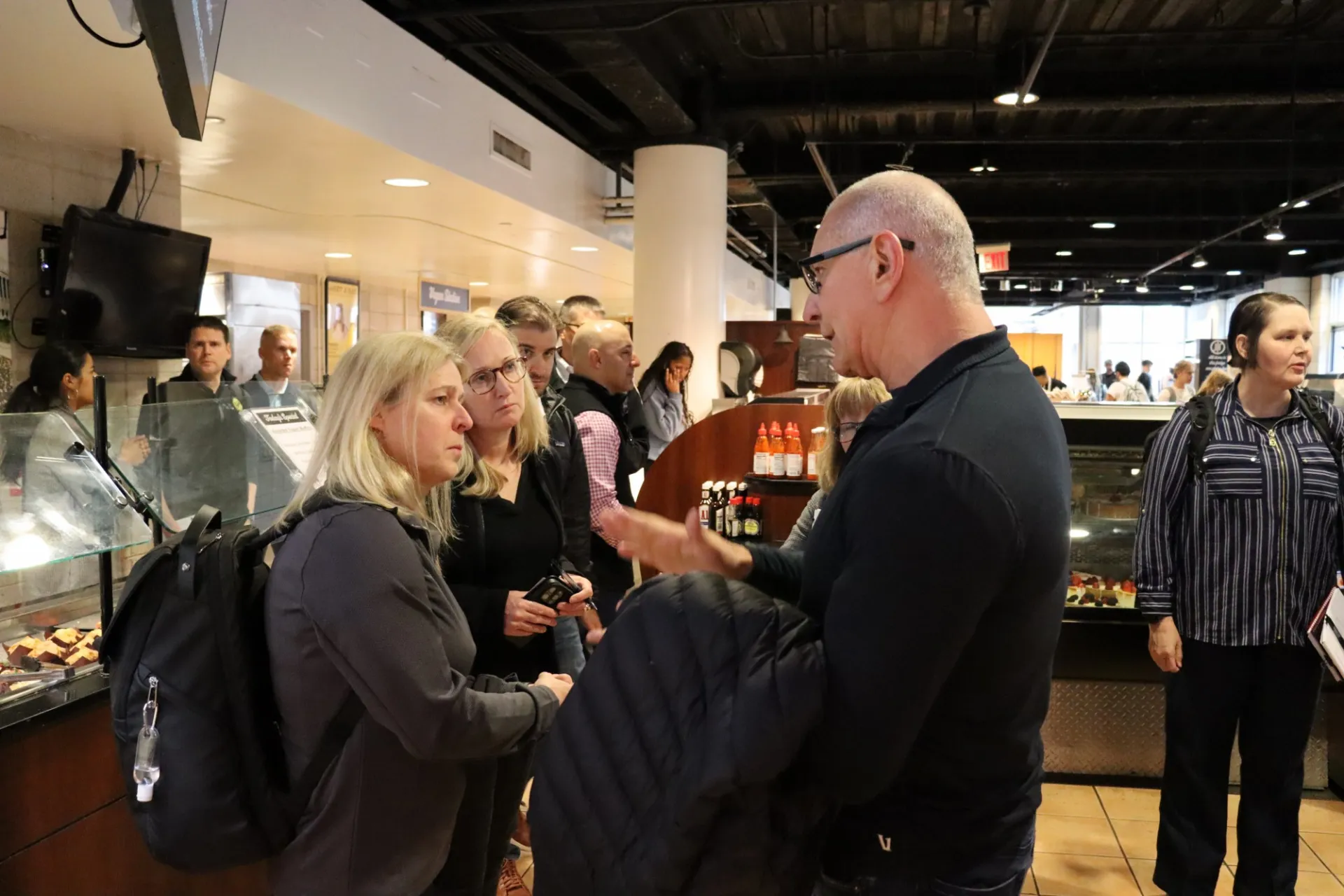 Robert Irvine talking with US Army representatives