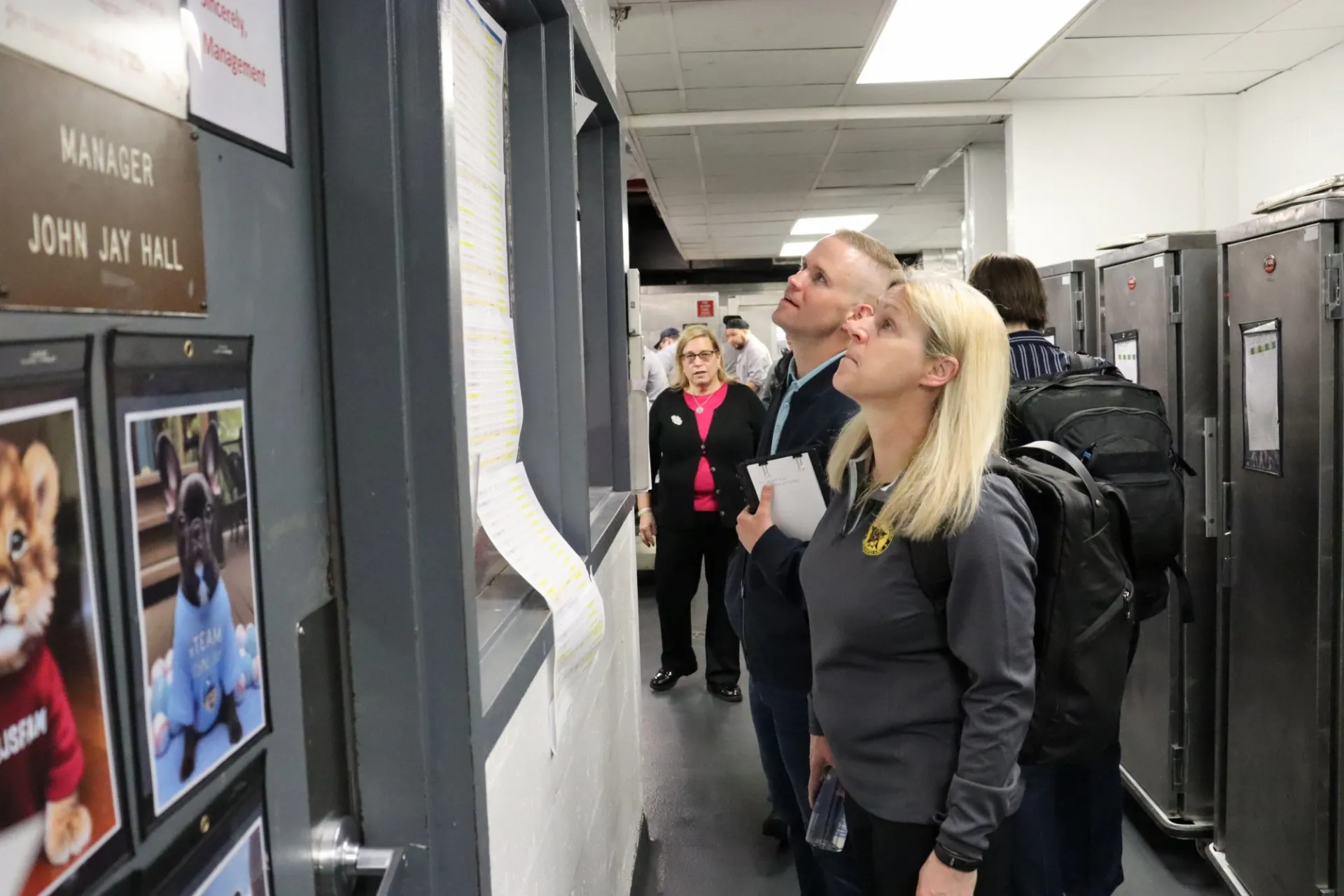 US Army representatives on the tour at John Jay Dining Hall kitchen area