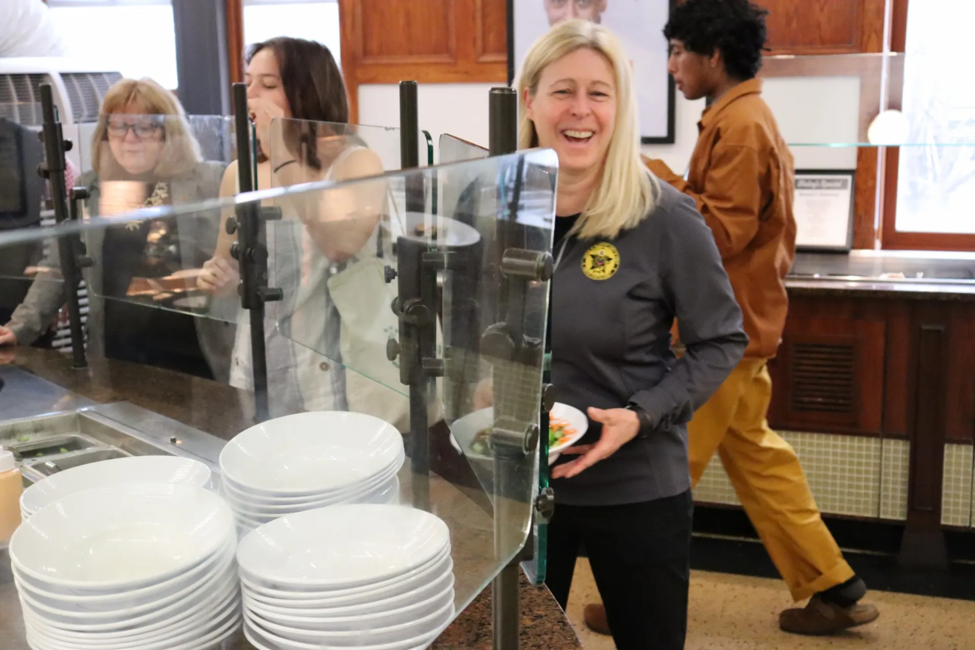 US Army representatives sampling a meal at John Jay Dining Hall