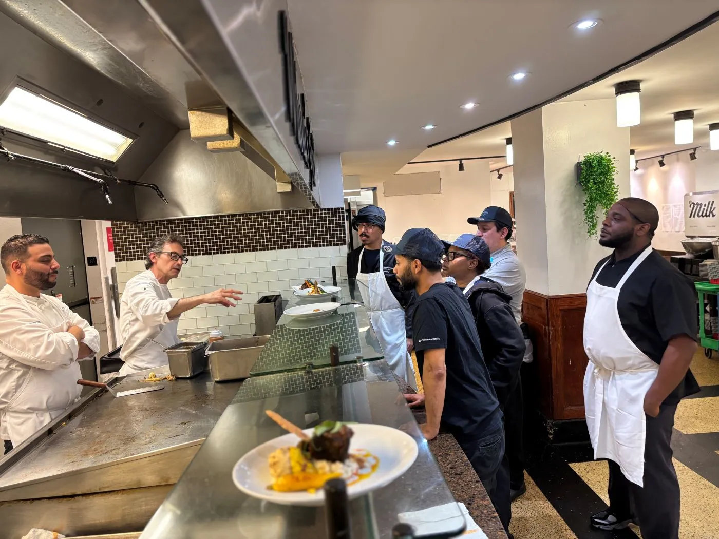 Chef Jerome reviews plate presentation 