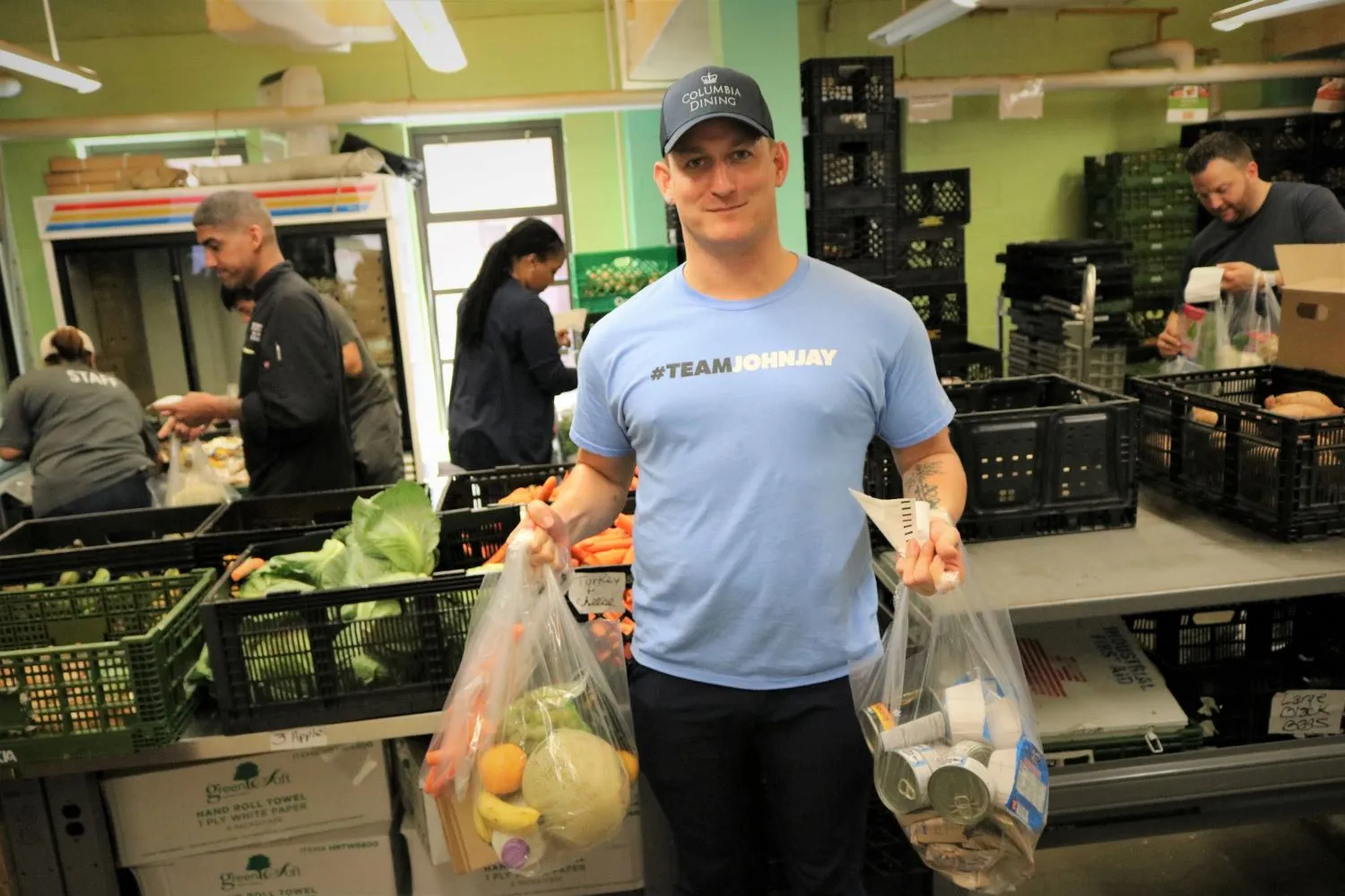 Charlie holding pantry packages