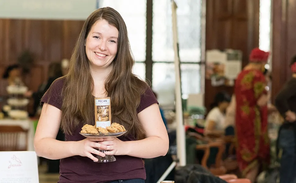 Janie holding pecan pie cookies