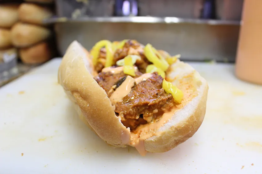 The Korean BBQ rib sub on a cutting board