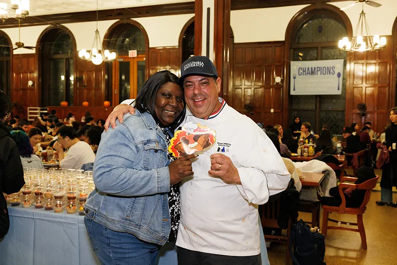 Iris and Mike pose for a picture in John Jay