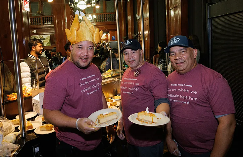 John Jay staff serve pumpkin cheesecake