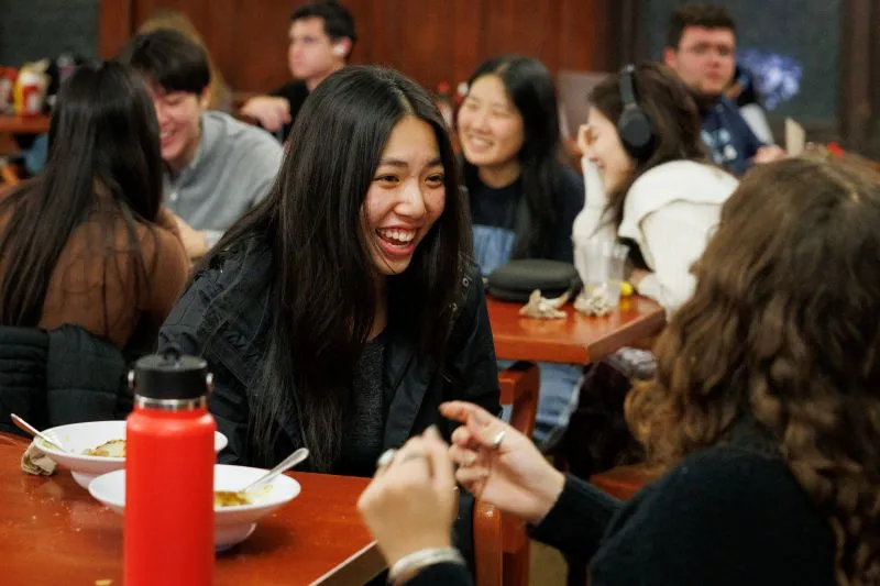 Students chatting in John Jay Dining Hall
